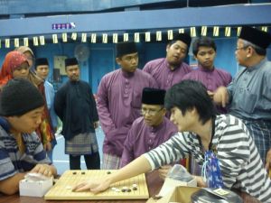 Demonstrating the game in Pusat Belia